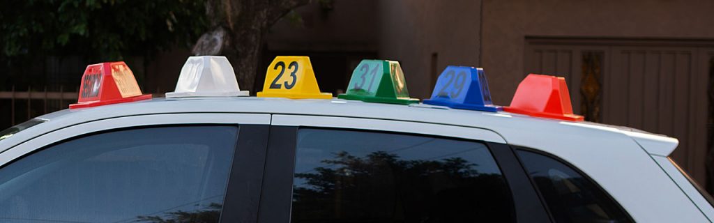 Car roof hats for vehicle identification